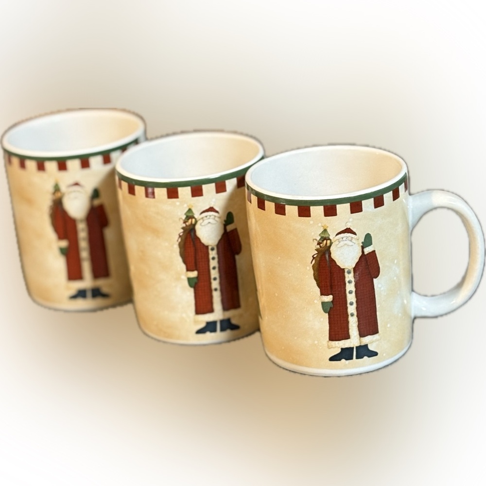 One Set of Three Debbie Mumm Folk Art Santa Mugs